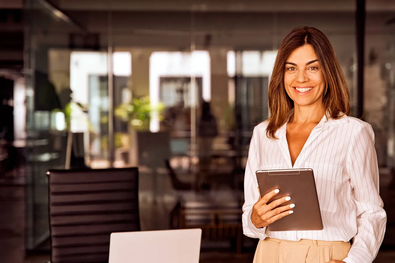 Financial intermediary reviewing training materials on a tablet