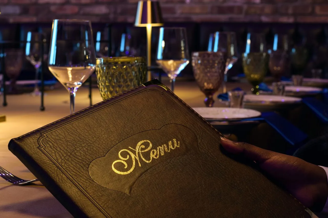 menu of luxury restaurant with table and glasses