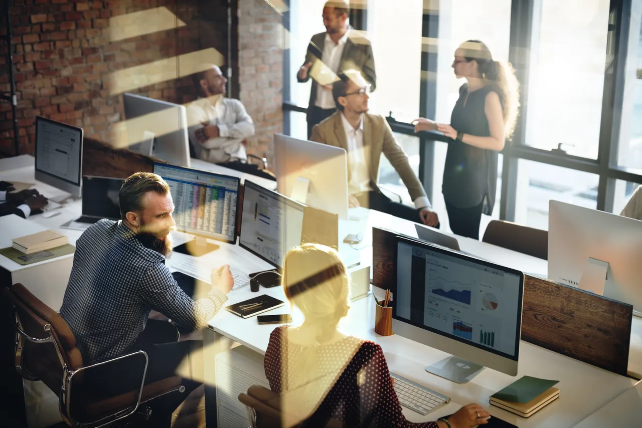 bankers in an office with light